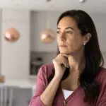 Divorce lawyer in McAllen, TX reviewing a divorce settlement agreement with a client